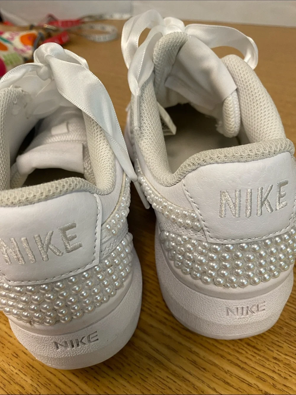 Nike White Platform Sneakers with Pearl Swoosh